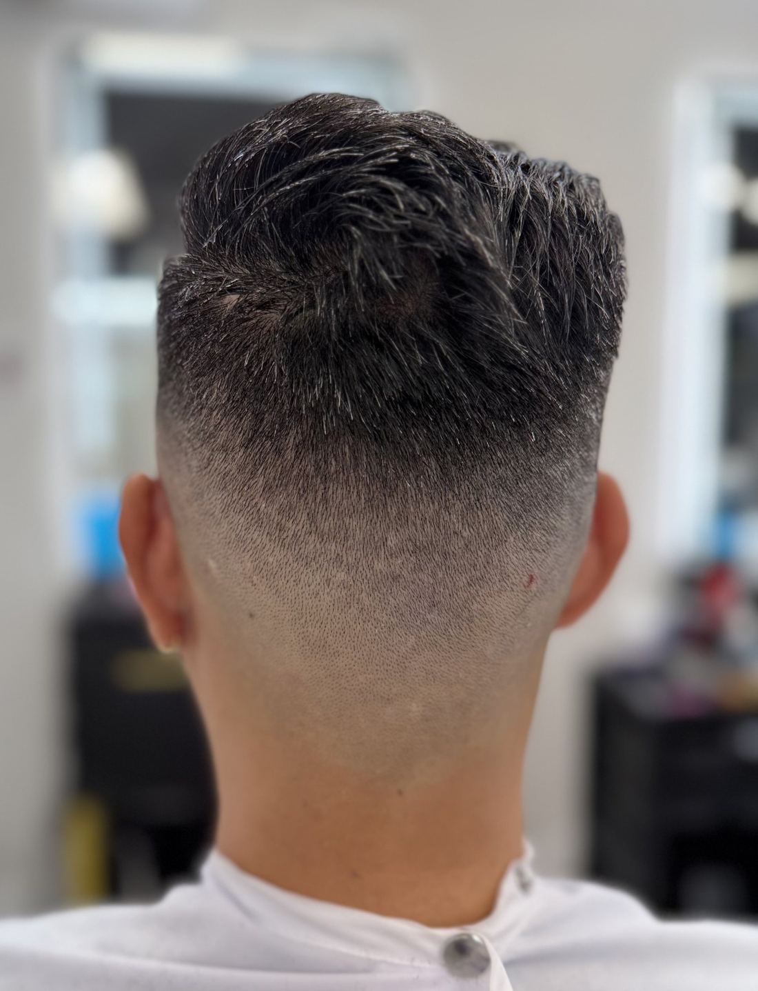 Textured spiky top with a fade seen from the back