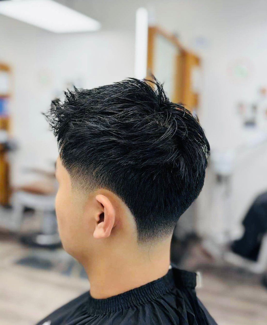 Textured crop with a low fade seen from behind